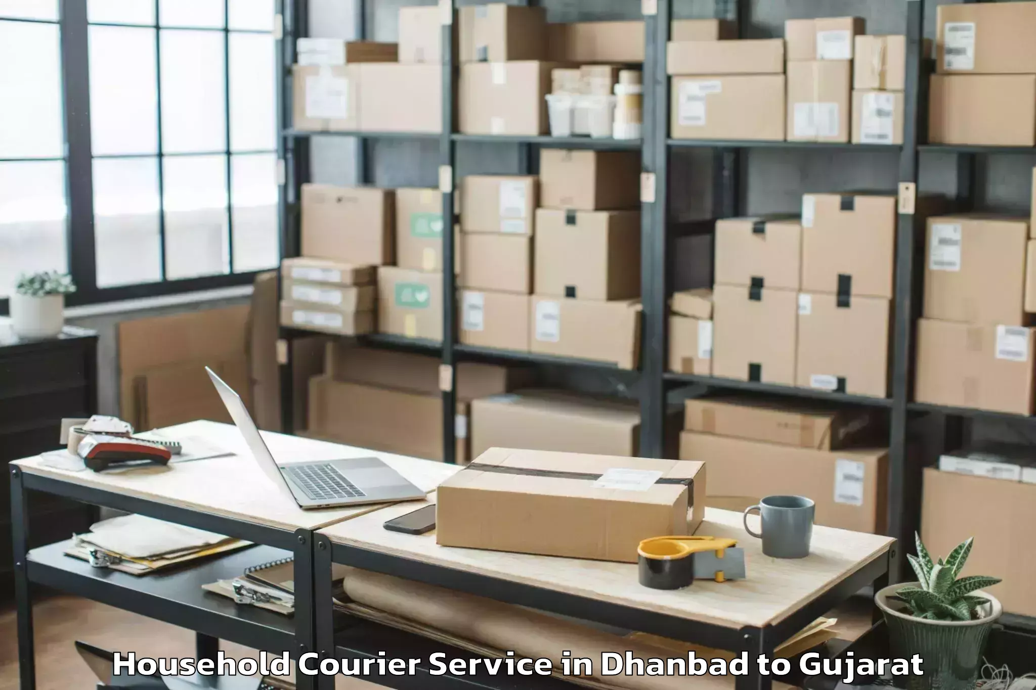 Trusted Dhanbad to Bhilad Household Courier